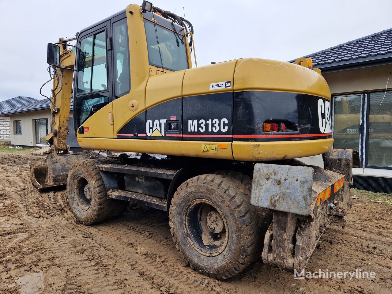 Caterpillar M313C excavadora de ruedas