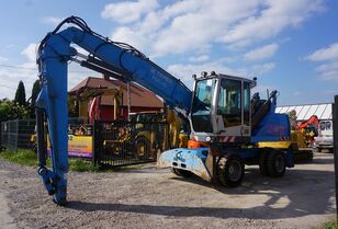 Terex-Fuchs MHL 320 manipulador de materiales