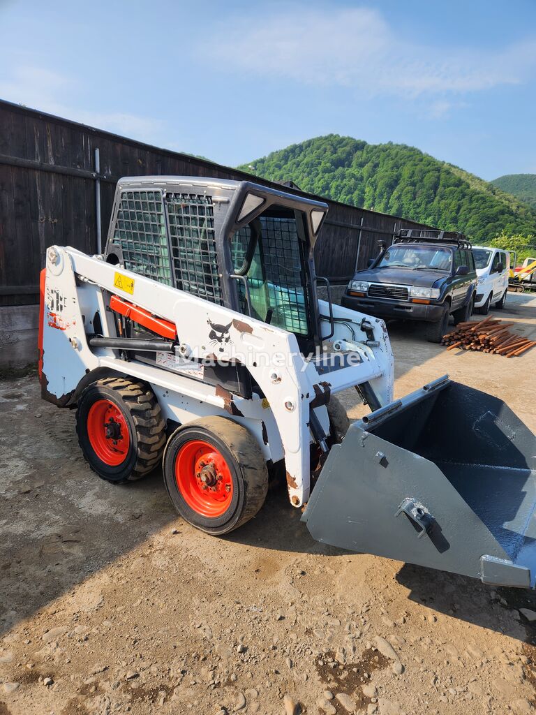 Bobcat S100 minicargadora